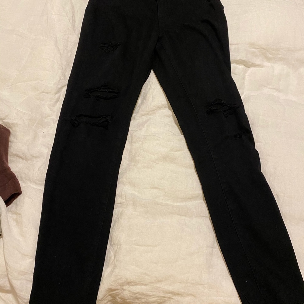 Distressed black raw edge Paige Skinny Jeans